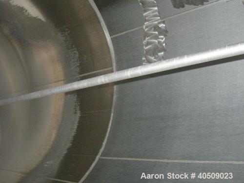 Used Cherry Burrell Silo Tank, 5,000 Gallon, Model SVW, 304 stainless steel, vertical. 84" diameter x 213" straight side, dished top, sloped bottom. Partial sidewall cold jacket, 40 square feet, rate...