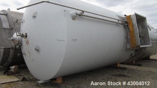 Used Cherry-Burrell Tank, 9000 Gallon, Model SVW, Stainless Steel, Vertical. Dished top, flat bottom. Jacketed on side bottom. Side bottom mounted prop style agitator, side bottom man way. Insulated ...