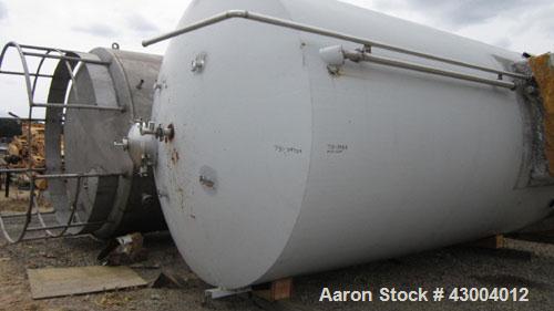 Used Cherry-Burrell Tank, 9000 Gallon, Model SVW, Stainless Steel, Vertical. Dished top, flat bottom. Jacketed on side bottom. Side bottom mounted prop style agitator, side bottom man way. Insulated ...
