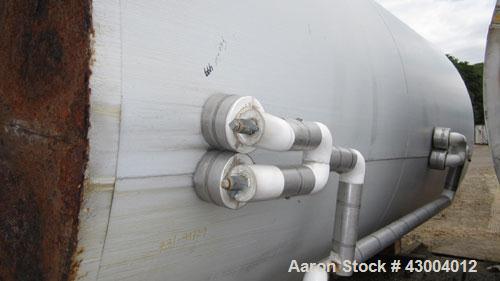 Used Cherry-Burrell Tank, 9000 Gallon, Model SVW, Stainless Steel, Vertical. Dished top, flat bottom. Jacketed on side bottom. Side bottom mounted prop style agitator, side bottom man way. Insulated ...