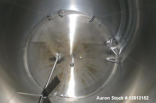 Used 8000 Gallon Stainless Steel Cherry Burrell Top Agitated Mix Tank. 