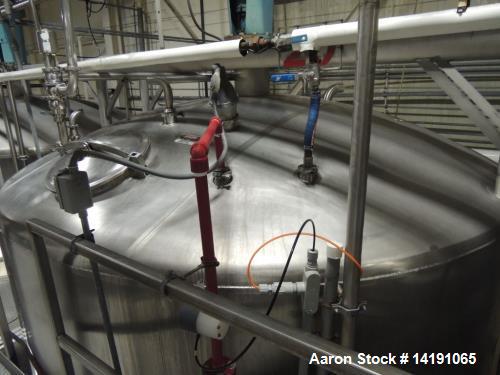 Used 10,000 Gallon Cherry Burrell Stainless Steel Jacketed Mix Tank. 316L SS contact parts with T304 SS exterior parts. Dimensions 136" ID x 153" Straight Side. 254" OAH - not including drive. Jacket...