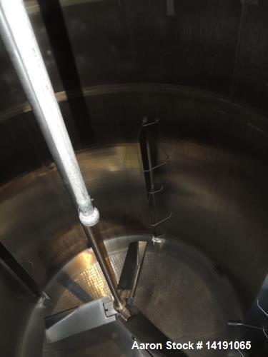 Used 10,000 Gallon Cherry Burrell Stainless Steel Jacketed Mix Tank. 316L SS contact parts with T304 SS exterior parts. Dimensions 136" ID x 153" Straight Side. 254" OAH - not including drive. Jacket...