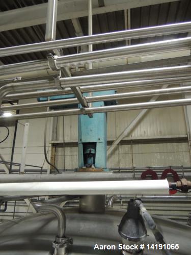 Used 10,000 Gallon Cherry Burrell Stainless Steel Jacketed Mix Tank. 316L SS contact parts with T304 SS exterior parts. Dimensions 136" ID x 153" Straight Side. 254" OAH - not including drive. Jacket...