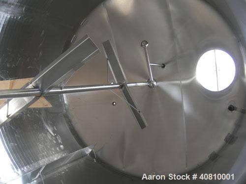 Used Cherry Burrell Jacketed Mix Tank, 7,200 Gallon, 304 Stainless Steel, Vertical.  120" diameter x 160" straight side, dished top, coned bottom.  Partial sidewall channel jacket, approximetly 150 s...