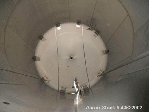 Used Cherry Burrell 10,000 gallon stainless steel storage tank. Approx. 10'6" diameter x 14' straight side. Dished heads. Side entering 3 hp XP agitator, 230/460 volt, 3/60, 1170 rpm. 3-blade prop. 1...