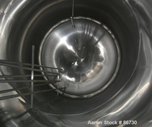 USED: Cherry Burrell tank, model EH, 10,000 gallons, 304 stainless steel, horizontal. 110" diameter x 243" straight side, dished heads. (3) pass 1" diameter internal cooling tube, (4) spray balls. En...