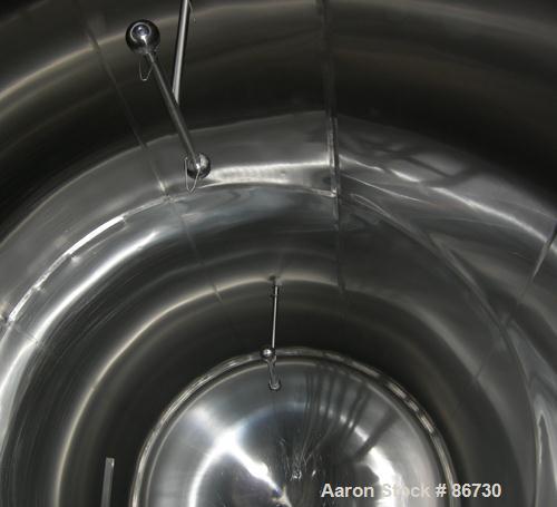USED: Cherry Burrell tank, model EH, 10,000 gallons, 304 stainless steel, horizontal. 110" diameter x 243" straight side, dished heads. (3) pass 1" diameter internal cooling tube, (4) spray balls. En...