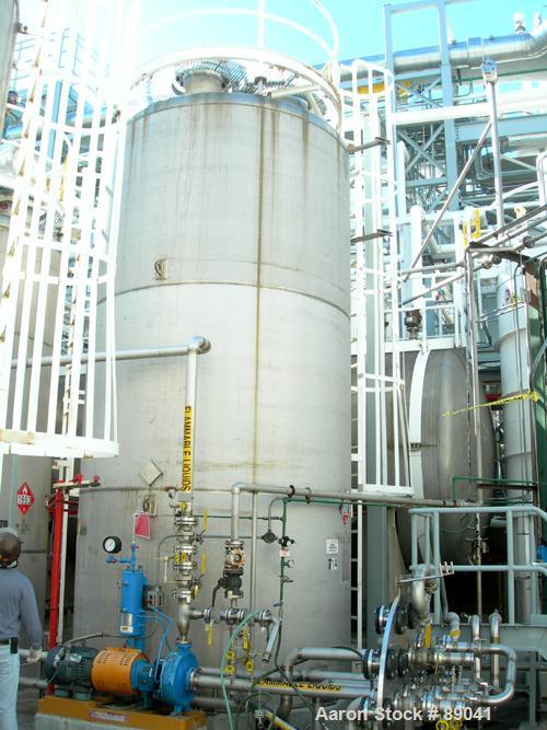 USED: Chicago Boiler tank, 8500 gallon, 316 stainless steel, vertical. Approximately 108" diameter x 18' straight side, dish top, flat bottom. Internal rated 2 psi at 300 deg F. Openings: top (3) 2",...