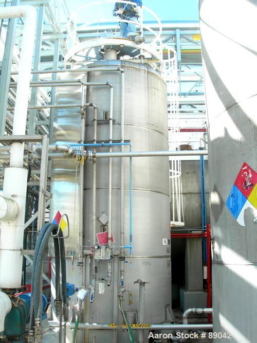 USED: Chicago Boiler tank, 6000 gallon, 316 stainless steel, vertical. Approximately 96" diameter x 16' straight side, dish top, flat bottom. Internal rated 2 psi at 300 deg F. Openings: top (3) 2", ...