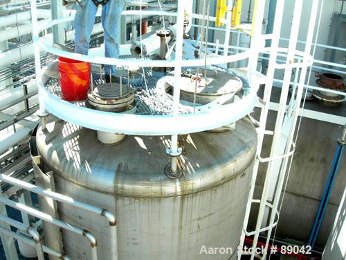 USED: Chicago Boiler tank, 6000 gallon, 316 stainless steel, vertical. Approximately 96" diameter x 16' straight side, dish top, flat bottom. Internal rated 2 psi at 300 deg F. Openings: top (3) 2", ...