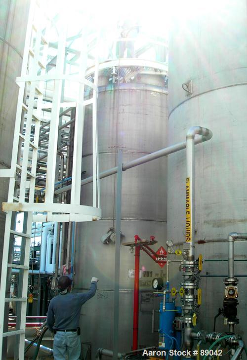 USED: Chicago Boiler tank, 6000 gallon, 316 stainless steel, vertical. Approximately 96" diameter x 16' straight side, dish top, flat bottom. Internal rated 2 psi at 300 deg F. Openings: top (3) 2", ...