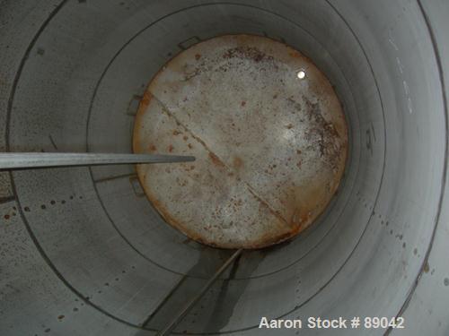 USED: Chicago Boiler tank, 6000 gallon, 316 stainless steel, vertical. Approximately 96" diameter x 16' straight side, dish top, flat bottom. Internal rated 2 psi at 300 deg F. Openings: top (3) 2", ...