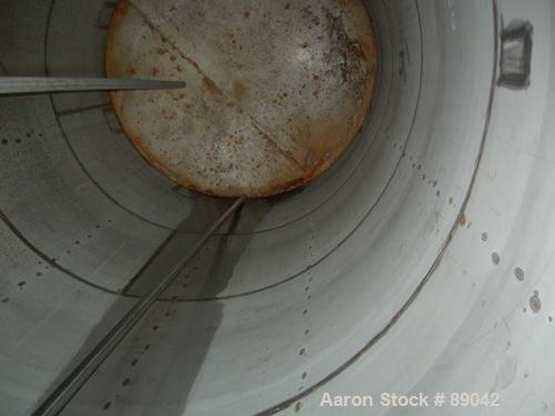 USED: Chicago Boiler tank, 6000 gallon, 316 stainless steel, vertical. Approximately 96" diameter x 16' straight side, dish top, flat bottom. Internal rated 2 psi at 300 deg F. Openings: top (3) 2", ...