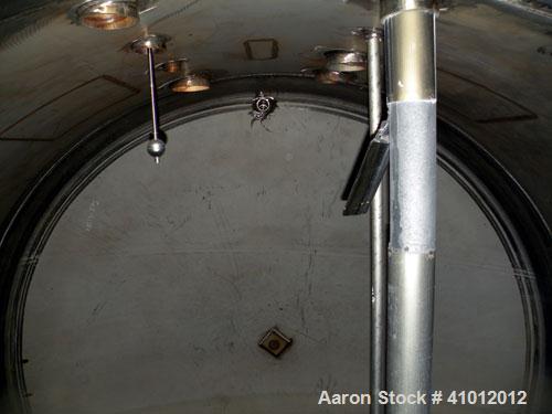 Used Clawson Tank Company 2 Compartment Pressure Tank, 12,000 gallons total, 6,000 gallons per compartment, 304L stainless steel, horizontal. Each compartment 125-1/2" diameter x 85" straight side, d...
