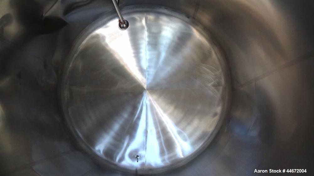 Used Creamery Package Storage Tank, 5000 Gallon, 304 Stainless Steel, Horizontal. Approximate 108" diameter x 116" straight side, dished heads. Insulated with carbon steel sheathing. Approximate 48" ...