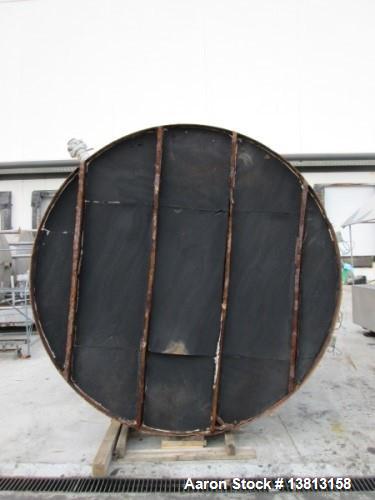 Used- 6,000 Gallon Stainless Steel Storage Tank. Approximately 98'' diameter x 16' straight wall, side manhole. Inlets 2 - 3...