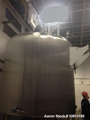 Used- Crepaco 6000 Gallon Jacketed Tank with Scrape Agitation. Stainless steel cone bottom tank. Sweep scrape agitated, driv...