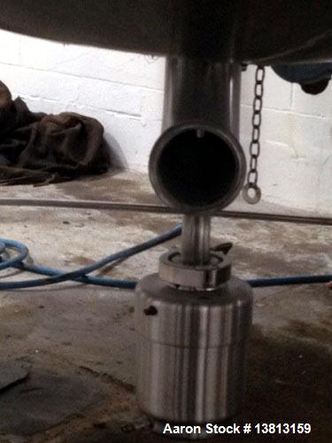 Used Crepaco 6000 Gallon Jacketed Tank with Scrape Agitation. Stainless steel cone bottom tank. Sweep scrape agitated, driven by a 5 HP Motor.  Jacket rated 158 PSI at 100 degrees F. Approximate ship...