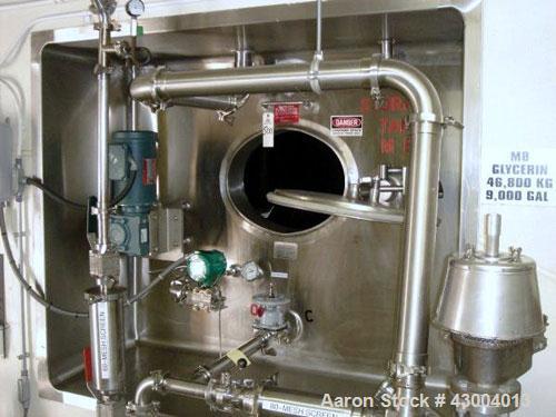 Used Crepaco Tank, 9000 Gallon, 304 Stainless Steel, Vertical. Dished top, flat bottom. Jacketed on side bottom. Side bottom mounted prop style agitator, side bottom man way. Insulated with carbon st...