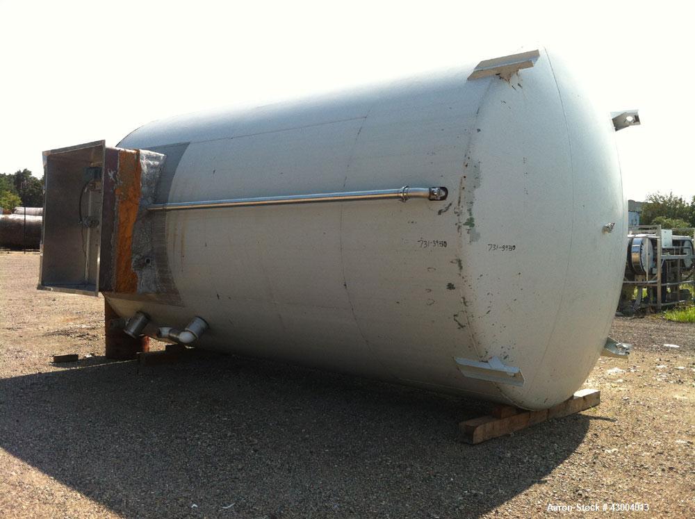 Used Crepaco Tank, 9000 Gallon, 304 Stainless Steel, Vertical. Dished top, flat bottom. Jacketed on side bottom. Side bottom mounted prop style agitator, side bottom man way. Insulated with carbon st...
