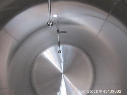 Used Crepaco Storage Tank, 5000 Gallon, 316 Stainless Steel, Horizontal. 96” Diameter x 144” straight side, dished heads. (1) Section approximate 48” wide x 103” long of bottom dimple jacket, no rati...