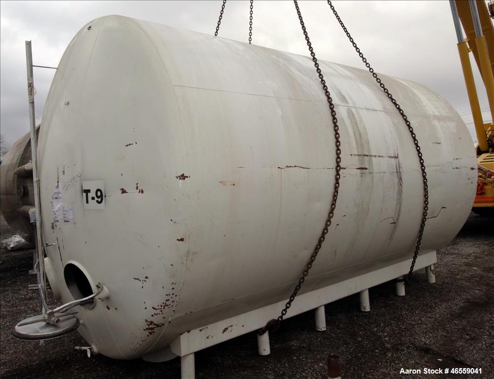 Used Crepaco Industries Tank, Approximately 10,000 gallon, 304 Stainless Steel, Horizontal. Approximate 124" diameter x 196" straight side. Dished heads. Openings: 20" x 16" oval manway with cover. T...