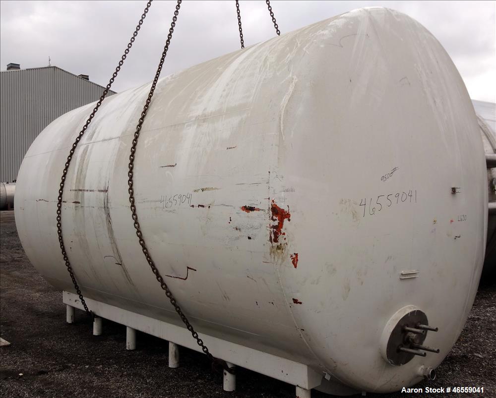 Used Crepaco Industries Tank, Approximately 10,000 gallon, 304 Stainless Steel, Horizontal. Approximate 124" diameter x 196" straight side. Dished heads. Openings: 20" x 16" oval manway with cover. T...