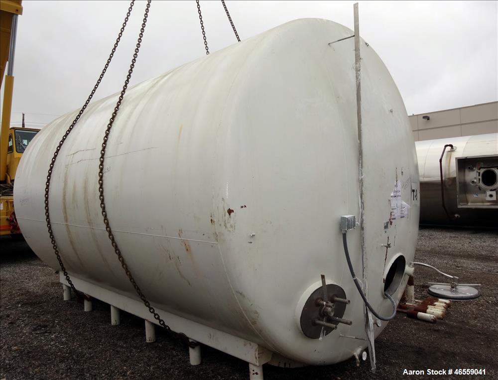 Used Crepaco Industries Tank, Approximately 10,000 gallon, 304 Stainless Steel, Horizontal. Approximate 124" diameter x 196" straight side. Dished heads. Openings: 20" x 16" oval manway with cover. T...