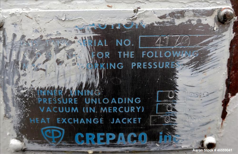 Used Crepaco Industries Tank, Approximately 10,000 gallon, 304 Stainless Steel, Horizontal. Approximate 124" diameter x 196" straight side. Dished heads. Openings: 20" x 16" oval manway with cover. T...