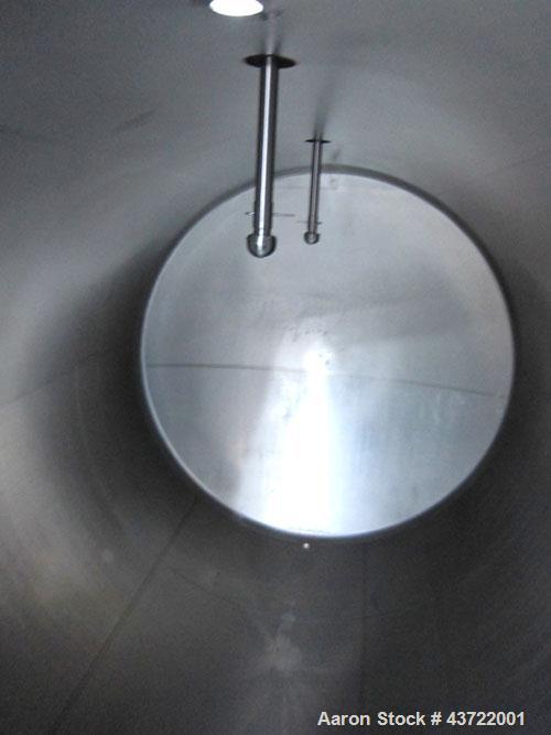 Used- Custom Metalcraft Tank, 5000 Gallon, 304 Stainless Steel, Horizontal. Approximately 96” diameter x 144” straight side,...