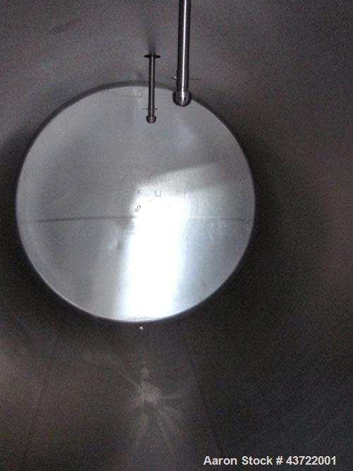 Used Custom Metalcraft Tank, 5000 Gallon, 304 Stainless Steel, Horizontal. Approximately 96” diameter x 144” straight side, dished heads.  Openings: top 3”, (2) 1-1/2”, 2”, heads 18” manway with cove...