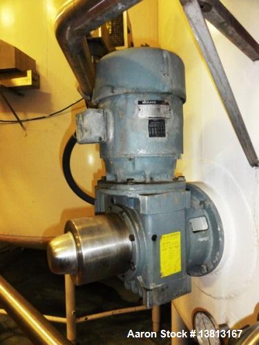 Used 10,000 DCI Gallon Mixing Tank with Vent on Top. Dish top and bottom electrically heated (previously used for liquid sugar). Bottom side manway, bottom side agitator 6.25hp Reuland motor. 11'-6" ...