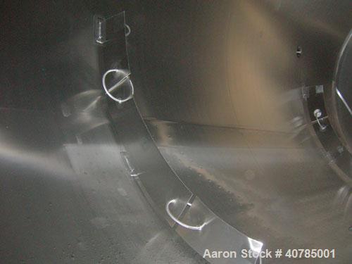 Used DCI 316L stainless steel storage tank, 10,000 gallon capacity, horizontal design. 120" inside diameter x 204" straight side, dished heads. Bottom 1/3 dimple jacket rated 62 psi @ 250 degrees F. ...