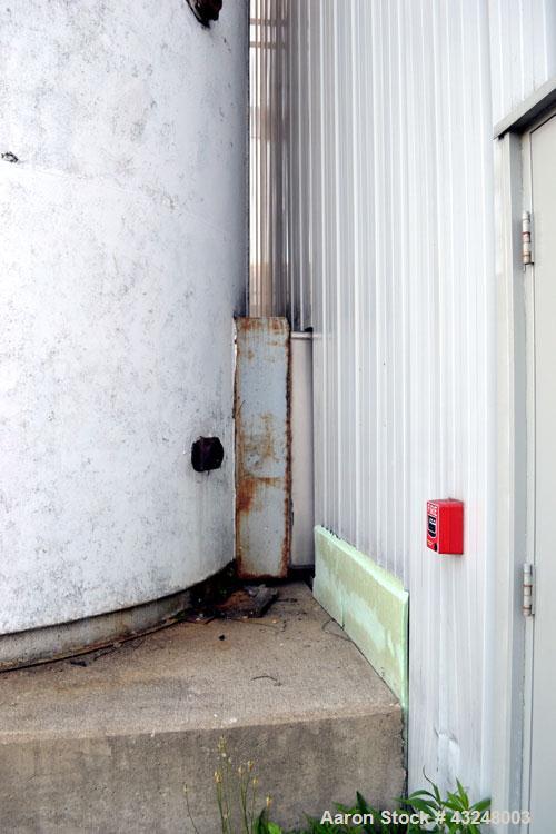 Used DCI Jacketed Silo, 3341 Cubic Feet (25,000 Gallon), Stainless Steel. Approximate 144" Diameter x 35' tall. Dished top, sloped bottom. Insulated with carbon steel sheathing. Side entering agitato...