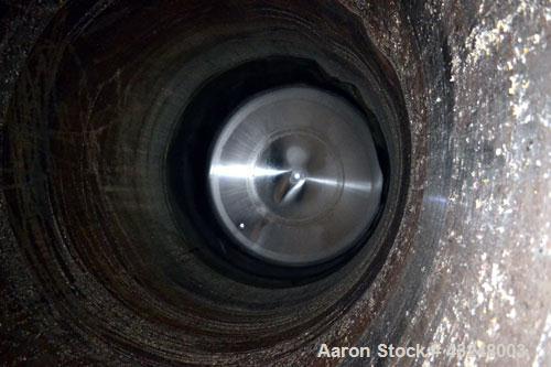 Used DCI Jacketed Silo, 3341 Cubic Feet (25,000 Gallon), Stainless Steel. Approximate 144" Diameter x 35' tall. Dished top, sloped bottom. Insulated with carbon steel sheathing. Side entering agitato...