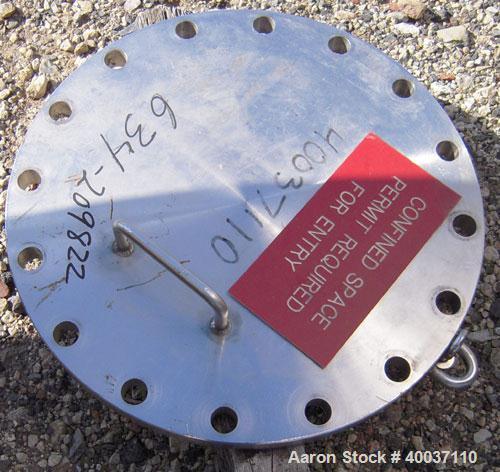 Used: Douglas Brothers pressure tank, 8970 gallon, stainless steel, horizontal. Approximately 114" diameter x 14' long, dished ends. Internal rated 35 psi at 200 deg.f.. (6) top nozzles, 18" end manw...