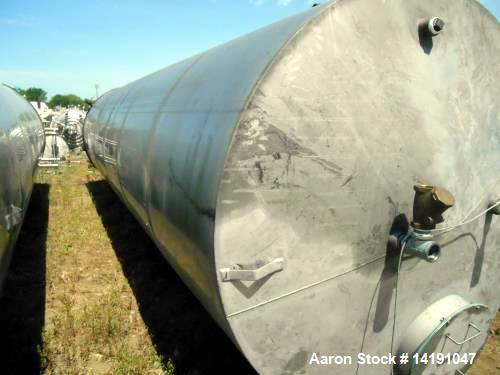 Used Eisenback 6,000 Gallon Stainless Steel Vertical Storage Tank. 304 stainless steel. Flat bottom, dished head, 6' 8" diameter x 24' straight side.