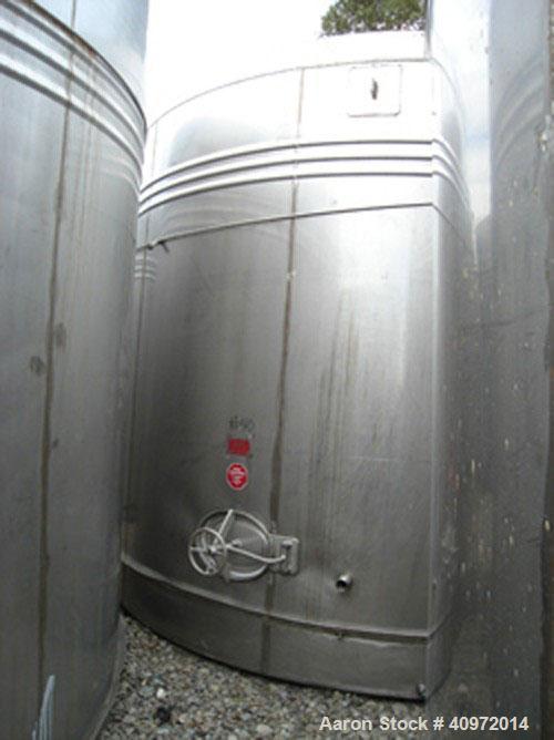 Used Approximately 13,000 US Gallon, Type 304 Stainless Steel, Storage Tank Manufactured by Ellet. Vertical design, 14'6" diameter x 10'6" straight side. Flat top and sloping bottom. 3 jacket rings l...