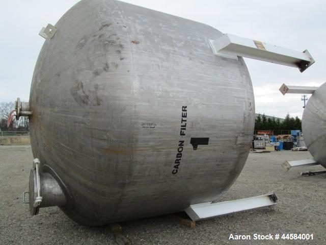Used Enerfab Inc Vertical Tank, Approximately 7000 Gallons, Stainless Steel. Approximately 12 foot diameter x 6 foot straight side.  Dished heads. Internal rated 125 PSI at 100 Degrees F.  4 Steel le...