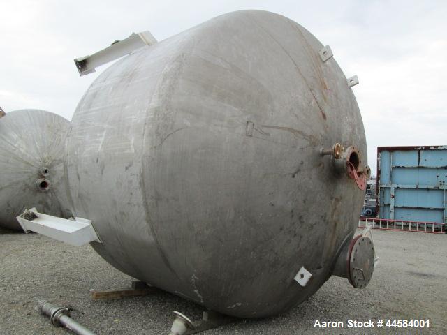 Used Enerfab Inc Vertical Tank, Approximately 7000 Gallons, Stainless Steel. Approximately 12 foot diameter x 6 foot straight side.  Dished heads. Internal rated 125 PSI at 100 Degrees F.  4 Steel le...