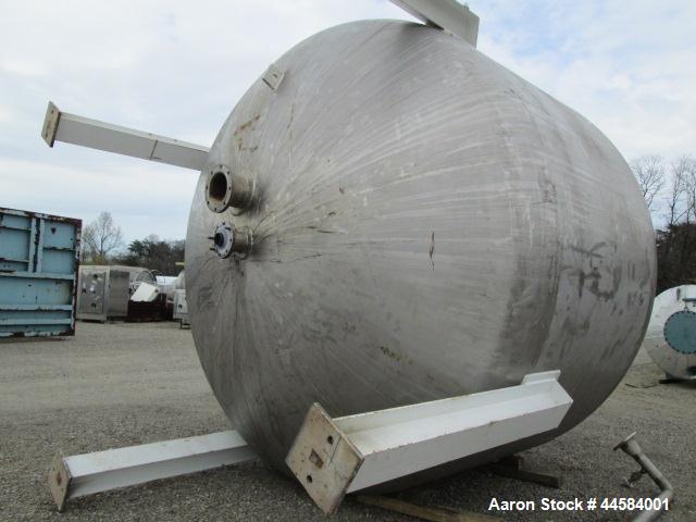 Used Enerfab Inc Vertical Tank, Approximately 7000 Gallons, Stainless Steel. Approximately 12 foot diameter x 6 foot straight side.  Dished heads. Internal rated 125 PSI at 100 Degrees F.  4 Steel le...