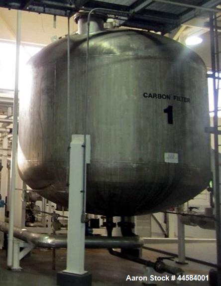 Used Enerfab Inc Vertical Tank, Approximately 7000 Gallons, Stainless Steel. Approximately 12 foot diameter x 6 foot straight side.  Dished heads. Internal rated 125 PSI at 100 Degrees F.  4 Steel le...