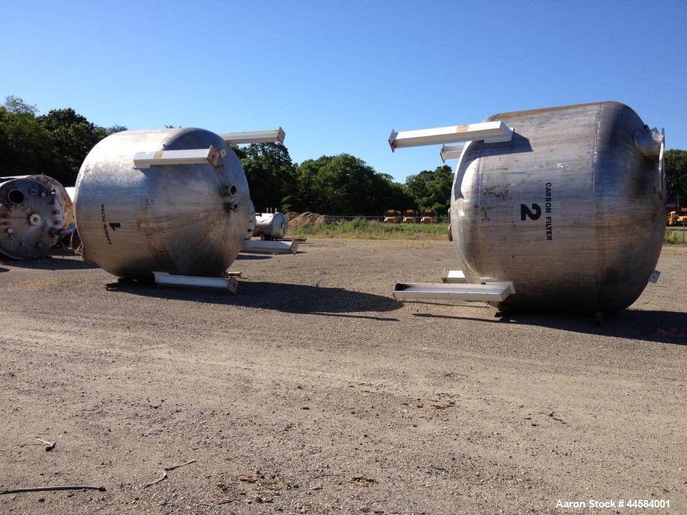 Used Enerfab Inc Vertical Tank, Approximately 7000 Gallons, Stainless Steel. Approximately 12 foot diameter x 6 foot straight side.  Dished heads. Internal rated 125 PSI at 100 Degrees F.  4 Steel le...