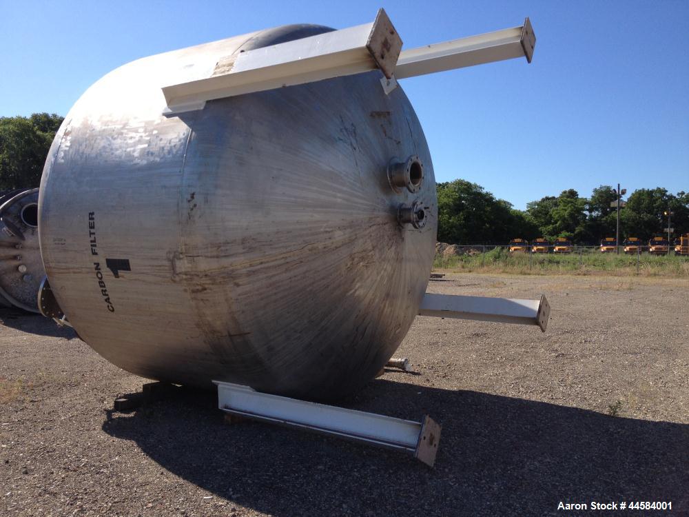 Used Enerfab Inc Vertical Tank, Approximately 7000 Gallons, Stainless Steel. Approximately 12 foot diameter x 6 foot straight side.  Dished heads. Internal rated 125 PSI at 100 Degrees F.  4 Steel le...