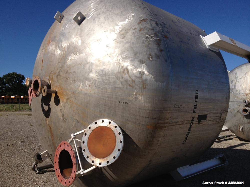 Used Enerfab Inc Vertical Tank, Approximately 7000 Gallons, Stainless Steel. Approximately 12 foot diameter x 6 foot straight side.  Dished heads. Internal rated 125 PSI at 100 Degrees F.  4 Steel le...