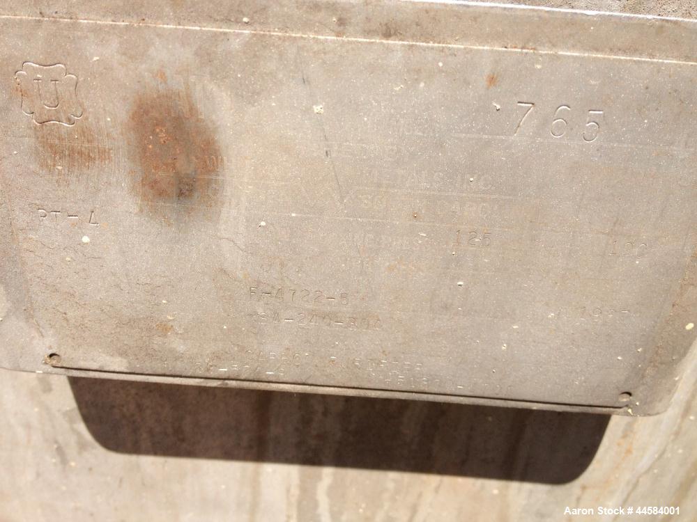 Used Enerfab Inc Vertical Tank, Approximately 7000 Gallons, Stainless Steel. Approximately 12 foot diameter x 6 foot straight side.  Dished heads. Internal rated 125 PSI at 100 Degrees F.  4 Steel le...