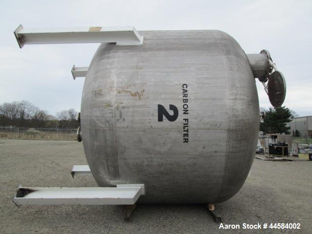 Used Enerfab Inc Vertical Tank. Approximately 7000 gallons, stainless steel. Approximately 12 ft diameter x 6 ft straight side.  Dished heads . Internal rated 125 psi @ 100 deg F.  4  Steel leg mount...