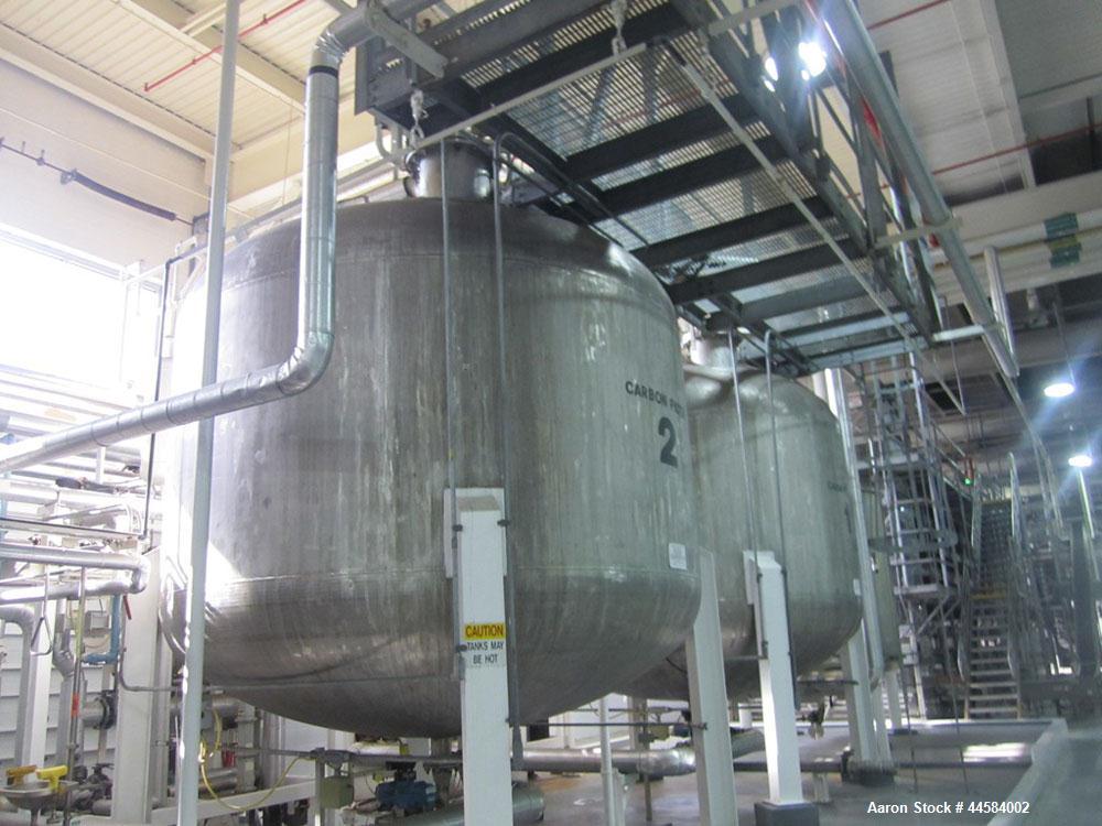Used Enerfab Inc Vertical Tank. Approximately 7000 gallons, stainless steel. Approximately 12 ft diameter x 6 ft straight side.  Dished heads . Internal rated 125 psi @ 100 deg F.  4  Steel leg mount...