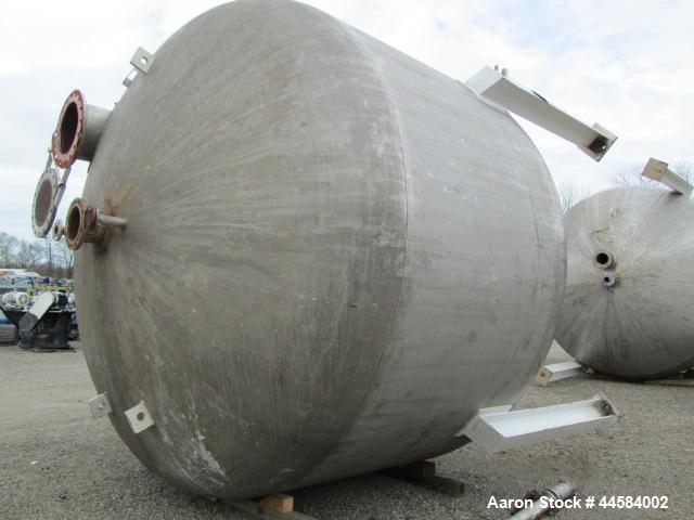 Used Enerfab Inc Vertical Tank. Approximately 7000 gallons, stainless steel. Approximately 12 ft diameter x 6 ft straight side.  Dished heads . Internal rated 125 psi @ 100 deg F.  4  Steel leg mount...